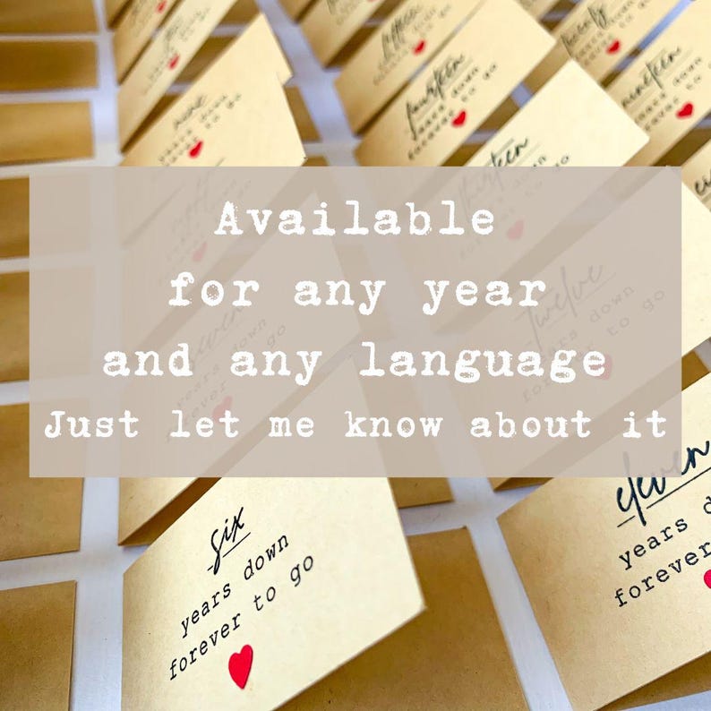 May include: A collection of small, tan cards with handwritten text and red heart accents. The cards feature phrases like "Six years down forever to go." The image includes the text "Available for any year and any language. Just let me know about it."