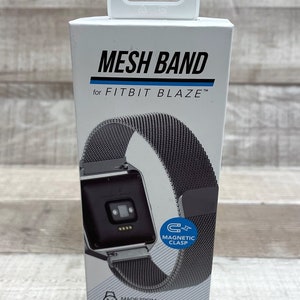 May include: A silver mesh band for a Fitbit Blaze smartwatch. The band has a magnetic clasp and is made from steel Milanese loop.