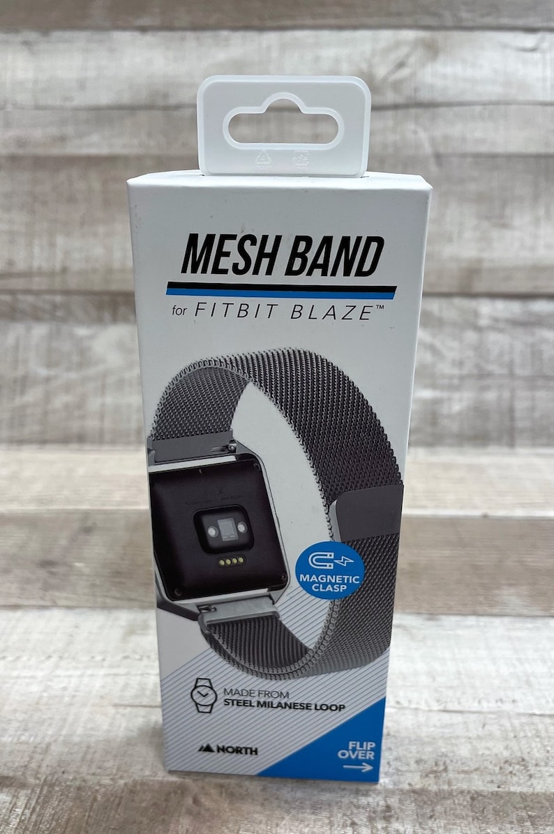 May include: A silver mesh band for a Fitbit Blaze smartwatch. The band has a magnetic clasp and is made from steel Milanese loop.