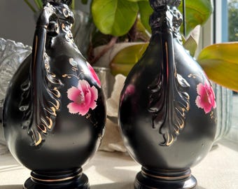 Premium Photo | Black roses in a glass vase