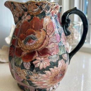 Vintage Chinese Floral Jug: Hand-Painted Porcelain with Gold Accents