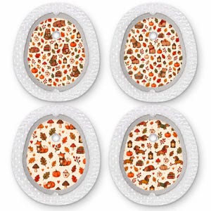 May include: Four oval adhesive patches with a white textured border and a central area featuring a repeating autumn pattern. The designs include bears, foxes, dachshunds, pumpkins, mushrooms, lanterns, and colorful fall leaves on a cream background.
