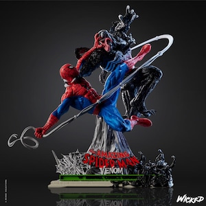 May include: A black and red Spider-Man figure is battling a black Venom figure. The figures are posed in a dynamic action scene. The base of the statue is decorated with a web design and the words "The Amazing Spider-Man Venom".