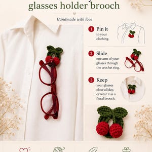 May include: A handmade cherry-shaped glasses holder brooch. The red glasses are held by the green crochet brooch. The image includes the text "How to use your glasses holder brooch".