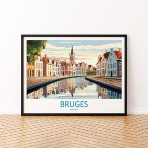 May include: Framed art print of Bruges, Belgium, featuring a canal lined with colorful buildings and a tall church spire. The artwork has a vintage travel poster style, with the word "BRUGES" in teal at the bottom.