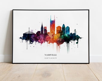 May include: A watercolour painting of the Nashville skyline with colourful splashes of paint. The city's iconic buildings are silhouetted against a white background. The text "NASHVILLE 36.1627° N, 86.7816° W" is printed below the skyline.