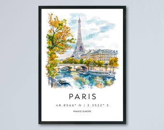Op de afbeelding: Aquarelprint van Parijs, met de Eiffeltoren, een rivier en gebouwen. Het kunstwerk bevat het woord "PARIS" en coördinaten. De print is ingelijst in een zwart frame.