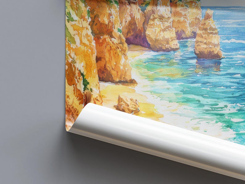 May include: Watercolor painting of a coastal landscape featuring golden cliffs, a sandy beach, and turquoise water. The artwork captures the natural beauty of the coastline with soft brushstrokes and vibrant colors. The image is partially rolled.
