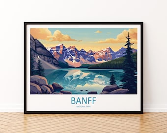 May include: A framed art print featuring a scenic view of Banff National Park. The artwork depicts a serene lake reflecting snow-capped mountains under a colorful sky. The print is framed in black, with the text "BANFF NATIONAL PARK" at the bottom.
