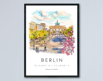 Może przedstawiać: Oprawiona akwarela przedstawiająca Bramę Brandenburską w Berlinie. Grafika przedstawia tętniącą życiem scenę uliczną z rowerzystami, drzewami i budynkami pod błękitnym niebem. Słowo "BERLIN" jest wyśrodkowane.
