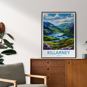 May include: A vintage travel poster featuring a scenic view of Killarney, Ireland. The poster depicts a lush green valley with a lake and mountains in the background. The text "KILLARNEY, IRELAND" is printed in blue and white at the bottom of the poster.