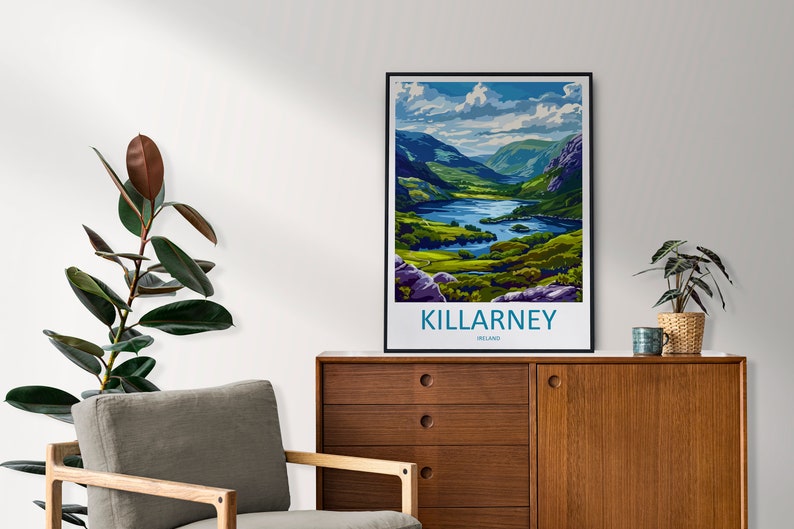 May include: A vintage travel poster featuring a scenic view of Killarney, Ireland. The poster depicts a lush green valley with a lake and mountains in the background. The text "KILLARNEY, IRELAND" is printed in blue and white at the bottom of the poster.