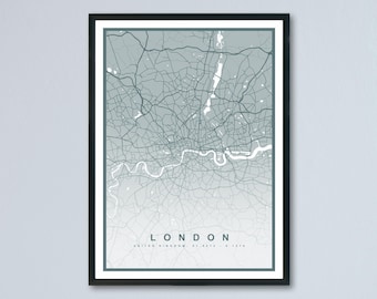 May include: Framed print of a map of London, United Kingdom, in shades of gray and white. The city's street grid and the Thames River are visible. The word "LONDON" is printed at the bottom, with the country and date.
