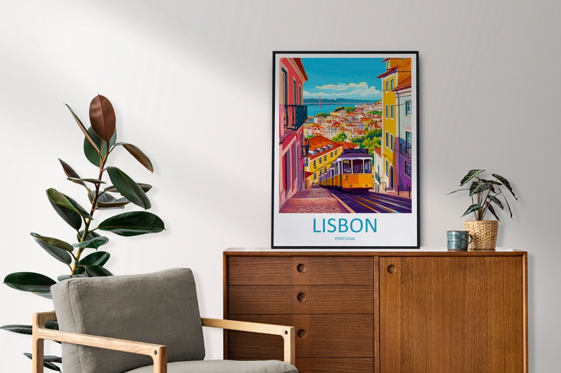 May include: A vintage travel poster featuring a yellow tram traveling up a hill in Lisbon, Portugal. The poster has a blue sky with white clouds and a view of the city in the background. The text "LISBON, PORTUGAL" is printed at the bottom of the poster.