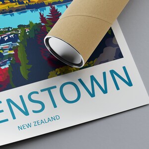 May include: A poster featuring a colourful illustration of a town and lake, with the text "QUEENSTOWN NEW ZEALAND" at the bottom.