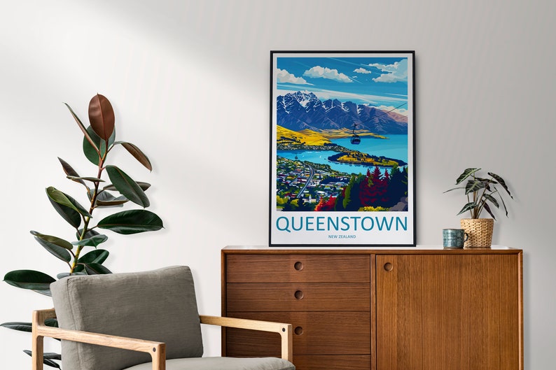 May include: A colourful poster depicting a scenic view of Queenstown, New Zealand. The poster features a cable car ascending a mountain with a lake and mountains in the background. The text "QUEENSTOWN NEW ZEALAND" is at the bottom of the poster.
