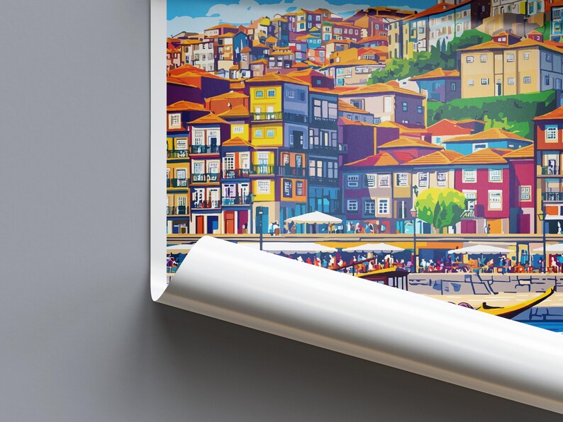 May include: A colorful art print depicting a European cityscape with buildings of various colors, including yellow, red, and blue. The print shows a waterfront scene with boats and people, and a partially unrolled edge.