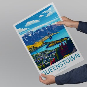 May include: A colourful illustration of Queenstown, New Zealand, with a cable car going up a mountain. The illustration features a blue lake, green mountains, and a town below. The text "QUEENSTOWN NEW ZEALAND" is at the bottom of the illustration.