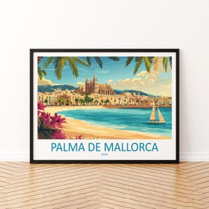 May include: Framed art print of Palma de Mallorca, Spain. The artwork depicts a coastal scene with a sailboat on turquoise water, a sandy beach, and a city with a large cathedral. Palm trees and pink flowers frame the top and bottom.