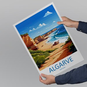 May include: A colorful illustration of a beach scene with cliffs, a sandy beach, and blue ocean waves. The text "ALGARVE PORTUGAL" is printed in blue at the bottom of the image.
