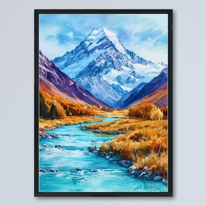 Puede incluir: Pintura en acuarela enmarcada de un paisaje de montaña. La obra representa un pico de montaña nevado, un río turquesa y follaje de color otoñal. La pintura está enmarcada en un marco negro.
