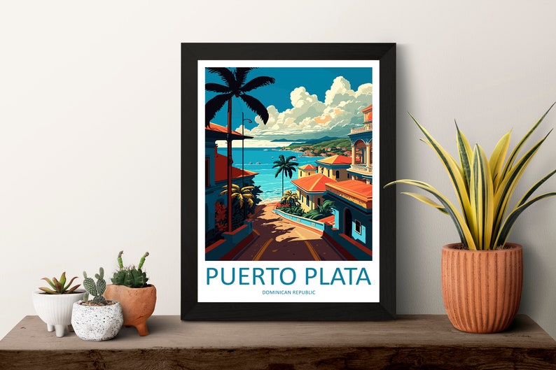 May include: A vintage travel poster featuring a colourful illustration of a street in Puerto Plata, Dominican Republic. The street leads down to a beach with blue water and palm trees. The poster has the text "PUERTO PLATA" and "DOMINICAN REPUBLIC" in blue.
