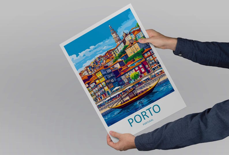 May include: A colorful art print of Porto, Portugal, featuring a detailed illustration of the city's waterfront with buildings, a boat, and the text "PORTO PORTUGAL". The print is held by a person.