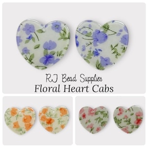 Floral Heart Cabs. Sold as a pair. 32mm x 34mm. Acrylic, flat back cabochons. Flower pattern in violet, pink and peach option. diy jewelry.