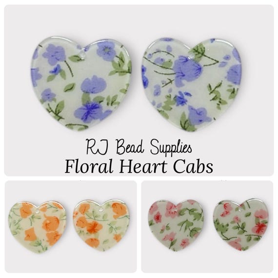 Floral Heart Cabs. Sold as a pair. 32mm x 34mm. Acrylic, flat back cabochons. Flower pattern in violet, pink and peach option. diy jewelry.