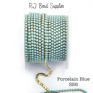 Porcelain Blue Metal Rhinestone Banding, SS6, dense, porcelain blue with gold chain, rhinestone chain, sold in 1 yard lengths