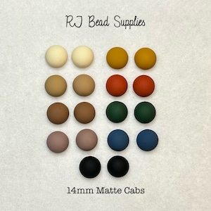 May include: Assortment of 14mm matte cabochons in various colours, including cream, brown, orange, red, green, blue, and black. RJ Bead Supplies 14mm Matte Cabs