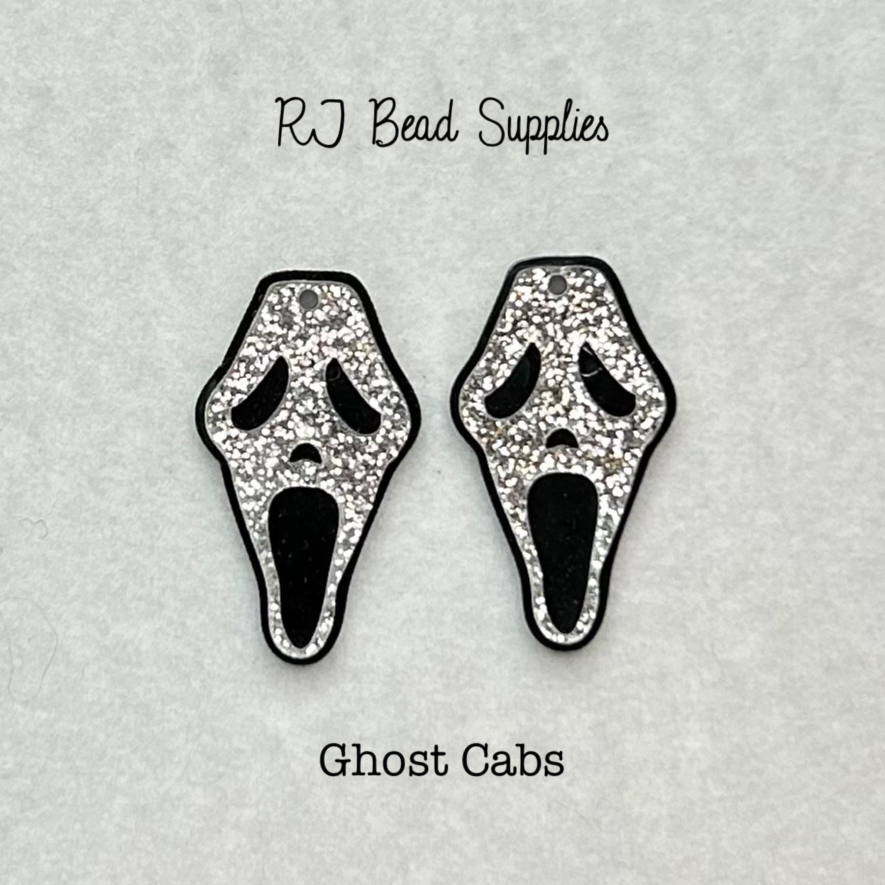 Ghost Cabs. Sold as a pair. 40mm x 23mm. Acrylic, black and silver, Halloween. Unique and excellent quality. Cabochons, diy jewelry. Charms.