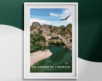 May include: A framed print of a scenic landscape featuring a natural stone arch over a river. The river is a vibrant green color and the sky is blue with white clouds. The text "LES GORGES DE L'ARDÈCHE FRANCE" is printed at the bottom of the print.