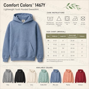 May include: A blue Comfort Colors 1467Y lightweight youth hooded sweatshirt with a front pocket and a hood. The image includes care instructions, a size chart in inches, and available colors: grey, black, ivory, chalky mint, blue jean, peachy, and crimson.