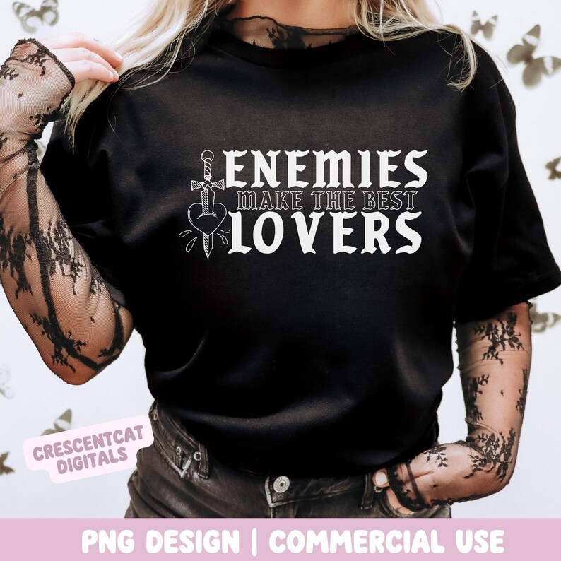 May include: Black t-shirt with the text "ENEMIES MAKE THE BEST LOVERS" in white, featuring a sword piercing a heart. The shirt is a PNG design for commercial use.
