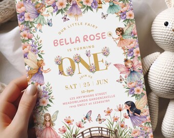 May include: A birthday invitation with a fairy theme. The invitation features the text "BELLA ROSE IS TURNING ONE" surrounded by floral and fairy illustrations. A crocheted white bunny sits to the right of the invitation.