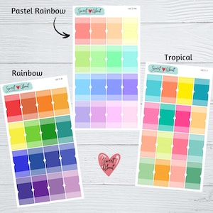 May include: Three sheets of colorful sticker paper with a rainbow theme. Each sheet has 24 stickers with a gradient of colors. The sheets are labeled "Pastel Rainbow", "Rainbow", and "Tropical".