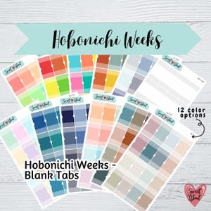 May include: Twelve different color options of blank tab stickers for Hobonichi Weeks planners. The stickers are in a variety of colors, including blue, green, pink, orange, and yellow. The stickers are arranged in rows and columns, and each sticker has a grid pattern.