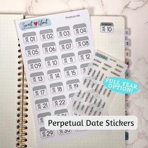 May include: A sheet of white planner stickers featuring gray-topped calendar date boxes numbered 01 through 30 with the text JAN, alongside a smaller transparent sheet of black text stickers listing days of the week and the text 365-DOY.
