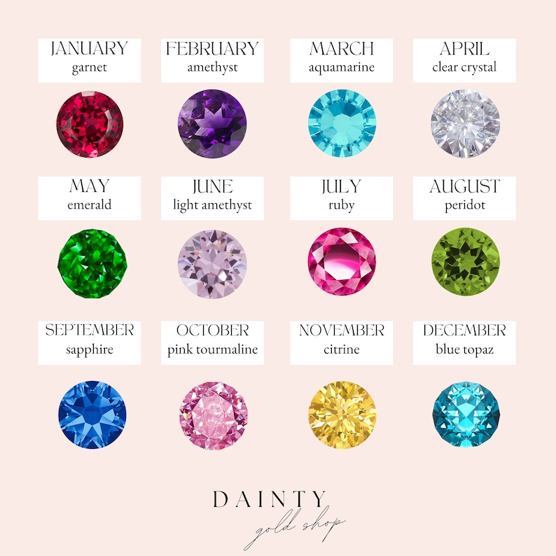 May include: A grid of twelve gemstones representing birthstones for each month. The gemstones are in various colors, including red, purple, blue, green, and pink. Each stone is labeled with the month and gemstone name. The shop name "DAINTY gold shop" is at the bottom.