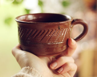 Handmade Earthenware Mug with Carved Design by Karn Kreft