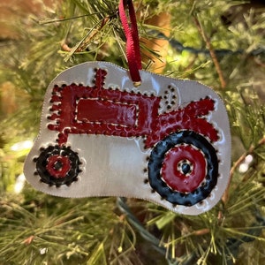 handmade hand punched metal tractor ornament