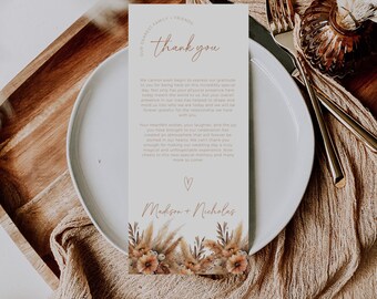 May include: A thank you card with a floral design and the text "Our Dearest Family & Friends, Thank You" and "Madison + Nicholas".