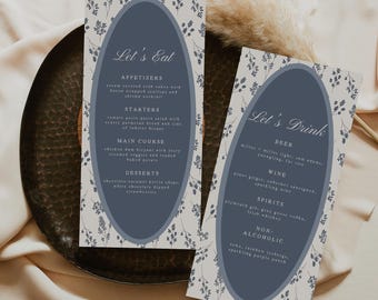 May include: Two menu cards with the text "Let's Eat" and "Let's Drink". The cards have a light background with a floral pattern and a dark blue oval in the center. The menu items are listed in a classic font.