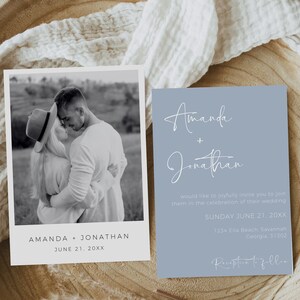 May include: A wedding invitation with a light blue background and white text. The invitation reads "Amanda + Jonathan" and includes the date "Sunday June 21, 20XX". The invitation also includes the address "1234 Ella Beach, Savannah, Georgia, 31302" and the text "Reception to follow".