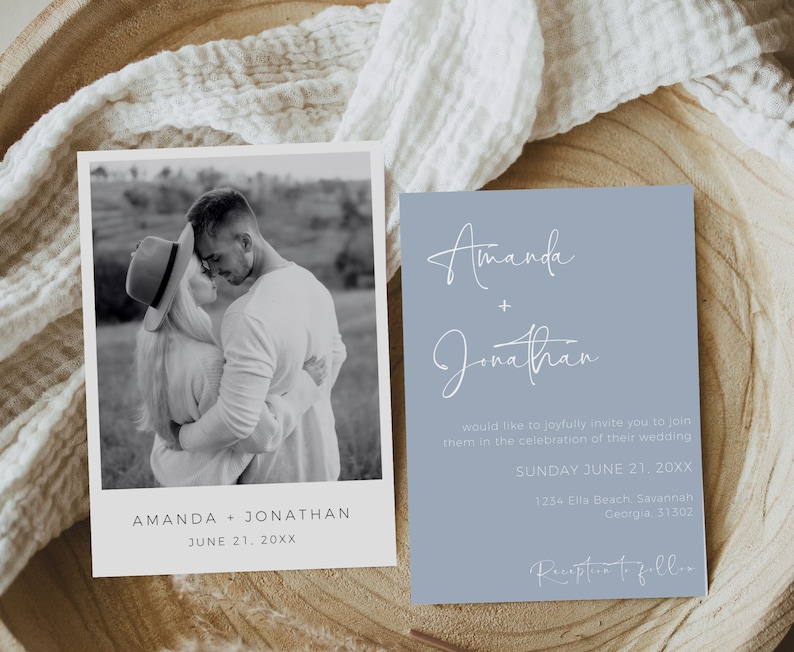 May include: A wedding invitation with a light blue background and white text. The invitation reads "Amanda + Jonathan" and includes the date "Sunday June 21, 20XX". The invitation also includes the address "1234 Ella Beach, Savannah, Georgia, 31302" and the text "Reception to follow".
