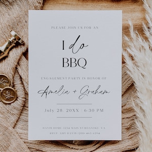 May include: A white card with black text announcing an engagement party with the words "I do BBQ" and the names "Amelia + Graham". The date and time of the party are July 28, 20XX at 6:30 PM. The location is Davis Home, 1234 Main St Roanoke VA. The RSVP information is Amy Davis (208) 403-6394.