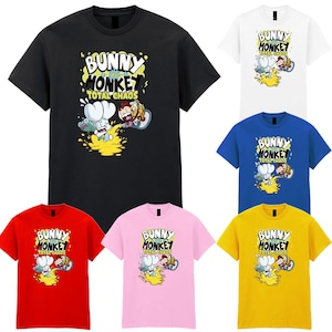 May include: A selection of short-sleeved t-shirts in various colours, including black, white, blue, red, pink, and yellow. Each shirt displays a cartoon graphic with the text "BUNNY MONKEY TOTAL CHAOS".