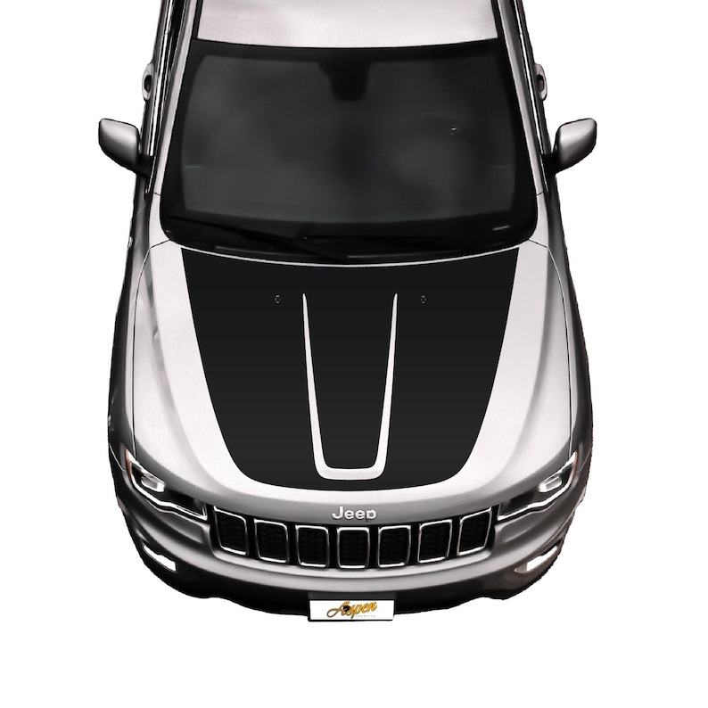 May include: A silver Jeep with a black hood decal featuring two black stripes with a white stripe in the center. The Jeep has a black grille with the word "Jeep" in white letters.