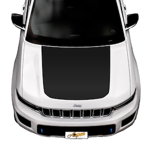 May include: A white Jeep with a black hood wrap. The Jeep has a black grille with the word "Jeep" in silver lettering. The front bumper has two blue lights on either side of the number plate.